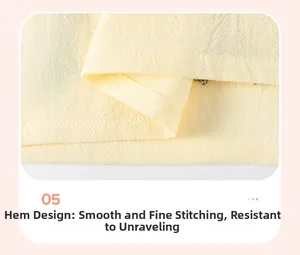 Close-up of fine stitching on light yellow girl's cotton dress hemline design