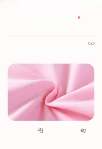 Détail du tissu en maille rose 100% coton 150g montrant la texture douce pour fillettes