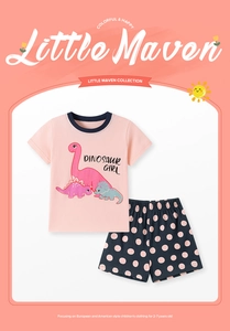 Close-up of pink dinosaur T-shirt and polka dot shorts set for girls aged 2 to 7