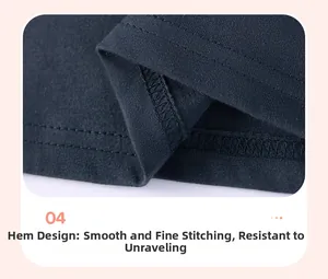Detail of double-needle stitched hem on dark blue cotton kids' shirt with durable finish