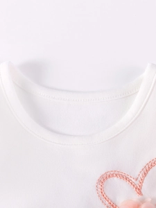 Girls white short-sleeve dress featuring pink heart embroidery and floral appliques