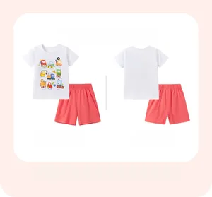 Detail of kids short sleeve set with cartoon digger print and elastic orange shorts