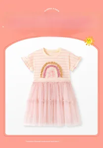 Detail of baby girl cotton dress featuring rainbow embroidery and pink tutu mesh skirt