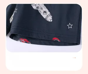Close-up of boys space theme shorts showing high-quality stitching and astronaut print