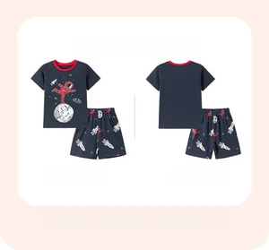 Flat lay view showing the front and back of boys navy cotton astronaut and rocket pajama set