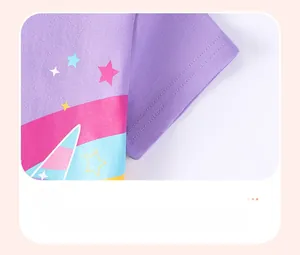 Detail of purple cotton T-shirt cuff with rainbow stripes and star patterns