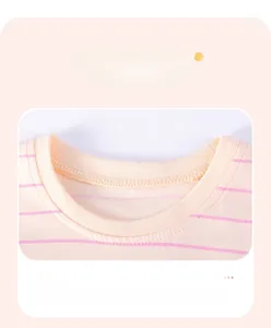 Close-up of baby girl pink striped dress with high-quality ribbed round neckline