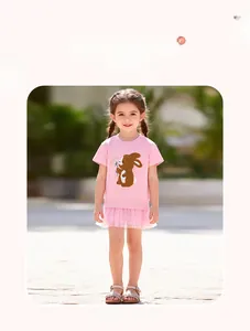 Close-up of pink girls cotton t-shirt with cute 3D bunny applique and soft mesh tutu skirt