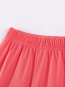 Kids coral pink cotton knit shorts with wide elastic waistband for boys and girls