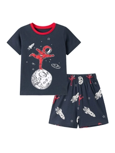 Short sleeve boy's pajama set featuring navy blue space astronaut and rocket prints