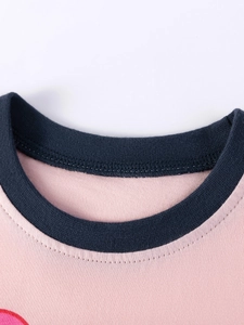 Pink cotton kids T-shirt with navy crew neck showing high-quality double-needle stitching
