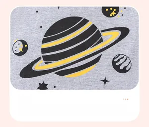 Detail of grey cotton fabric with cartoon space patterns including planets and stars