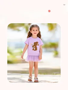 Detail of girl's purple summer dress with a cute rabbit applique embroidery on the top