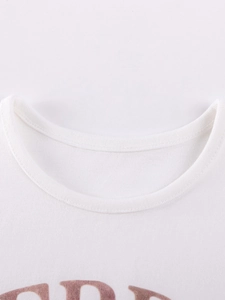 T-shirt blanc en coton pour enfants avec col rond côtelé et motif d'ours