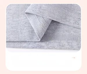 Detail of grey cotton knit hem showing durable double-needle interlocking stitching