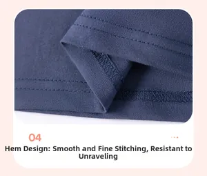 Gros plan détaillé de la double couture sur l'ourlet en coton bleu foncé pour fille