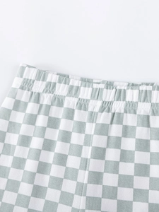 Conjunto de algodón para niña a cuadros verdes y blancos con detalle de cintura elástica