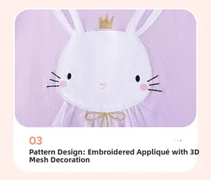 Detail of white rabbit embroidery with gold crown and purple mesh bow on cotton t-shirt