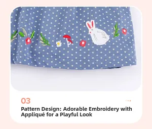 Close-up of girls' cotton dress featuring delicate rabbit applique and floral embroidery