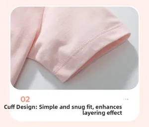 Détail de la manche d'un t-shirt en coton pour fille avec couture à double aiguille