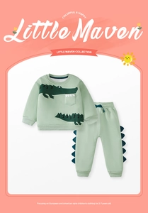 Detail of mint green toddler fleece set with crocodile embroidery and 3D dinosaur fins