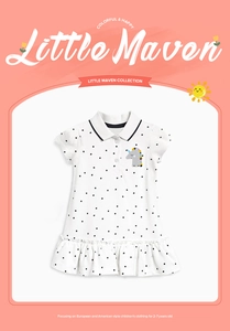 Detail of girls' white polka dot Polo dress with unicorn embroidery and ruffled hem