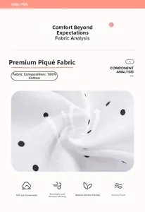 Detail of 100% cotton pique fabric with black polka dots for breathable polo dress