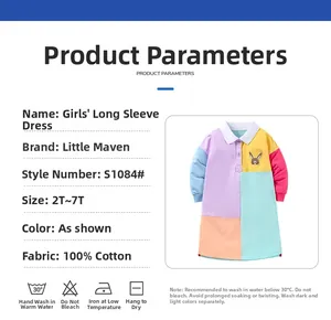 Detail of girls cotton long-sleeve dress showing cute rabbit embroidery and fabric specs