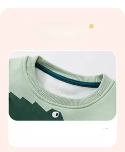 Detail of ribbed neckline and contrast back tape on fleece cartoon kids sweatshirt