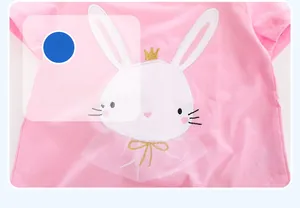 Detail of pink cotton T-shirt featuring a cute rabbit with 3D mesh collar and gold crown