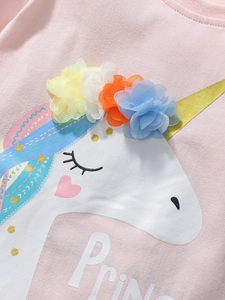Pink cotton t-shirt for girls featuring a 3D unicorn print with colorful mesh flowers