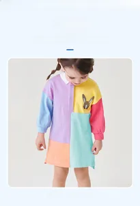 Detail of cotton polo dress featuring colorful color-block panels and rabbit embroidery