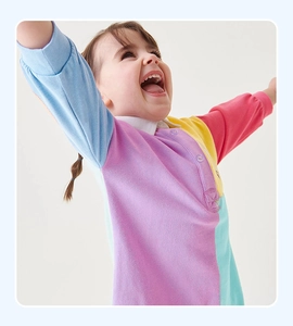 Detail of colorful long-sleeve polo dress for girls with bright color-block design