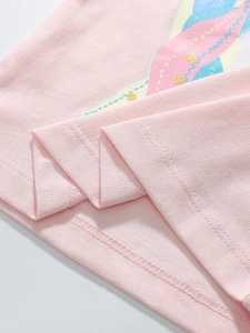 Pink girls' cotton t-shirt featuring soft knit hem and colorful cartoon print detail