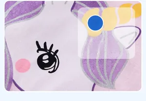 Macro shot of purple cotton knit fabric with glitter unicorn print for girls' summer sets