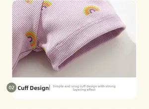 Detail of ribbed purple cotton sleeve cuff with colorful rainbow print patterns