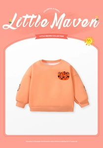 Detail of tiger patch embroidery on girls' warm fleece sweatshirt with ribbed cuffs