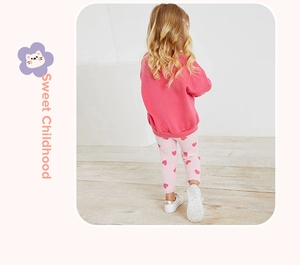 Pink girl's cotton sweatshirt set with heart print leggings shown from the back view
