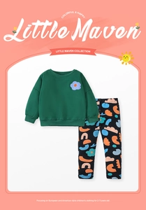 Detail of girls fleece sweatshirt set with floral embroidery and geometric print pants