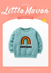 Detail of kids fleece sweatshirt featuring rainbow embroidery and ribbed cuffs