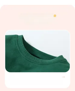 Close-up of the high-density ribbed collar with fine stitching on green knit sweatshirt