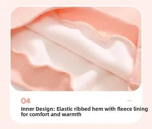Detail of pink fleece lining and elastic ribbed hem on girl's winter sweatshirt set