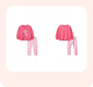 Detailed front and back view of girls' cotton sweatshirt set with heart print and text