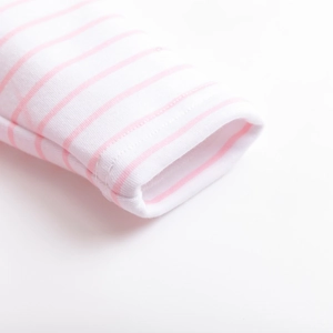 Detail of pink and white striped cotton knit sleeve with premium double stitching