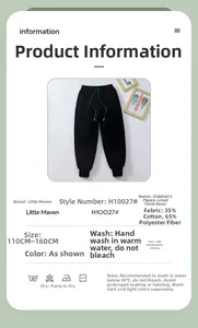 Detail view of black kids thermal pants with green drawstring and fabric information
