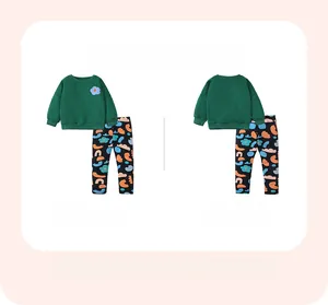 Front and back view of girls green fleece sweatshirt and colorful patterned pants set