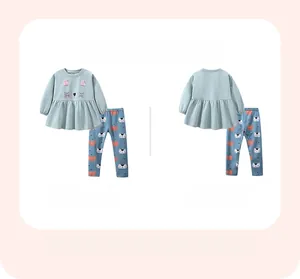 Detail view of toddler girls cotton sweatshirt set with cat print and ruffled hemline