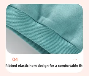 Detail of the mint green sweatshirt featuring elastic ribbed hem for a comfortable fit