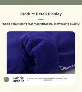 Detail of warm navy blue fleece lining for boys' winter pants showing thick soft texture