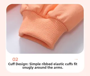 Close-up of pink fleece sweatshirt ribbed elastic cuffs showing soft fabric texture